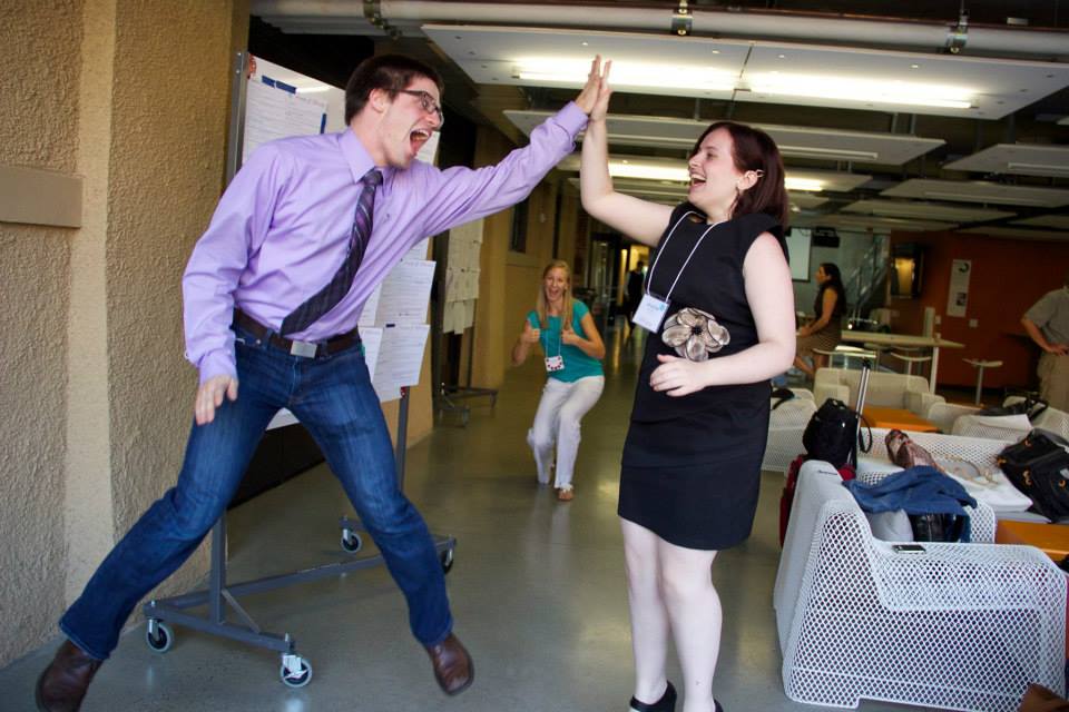 High energy and high fives at the Epicenter Research Summit (2014) with co-presenters Elliot Roth and Bre Przestrzelski.